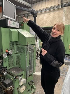 Kenay Managing Director Jill Naylor with the new napkin printing machine at their HQ in Runcorn 